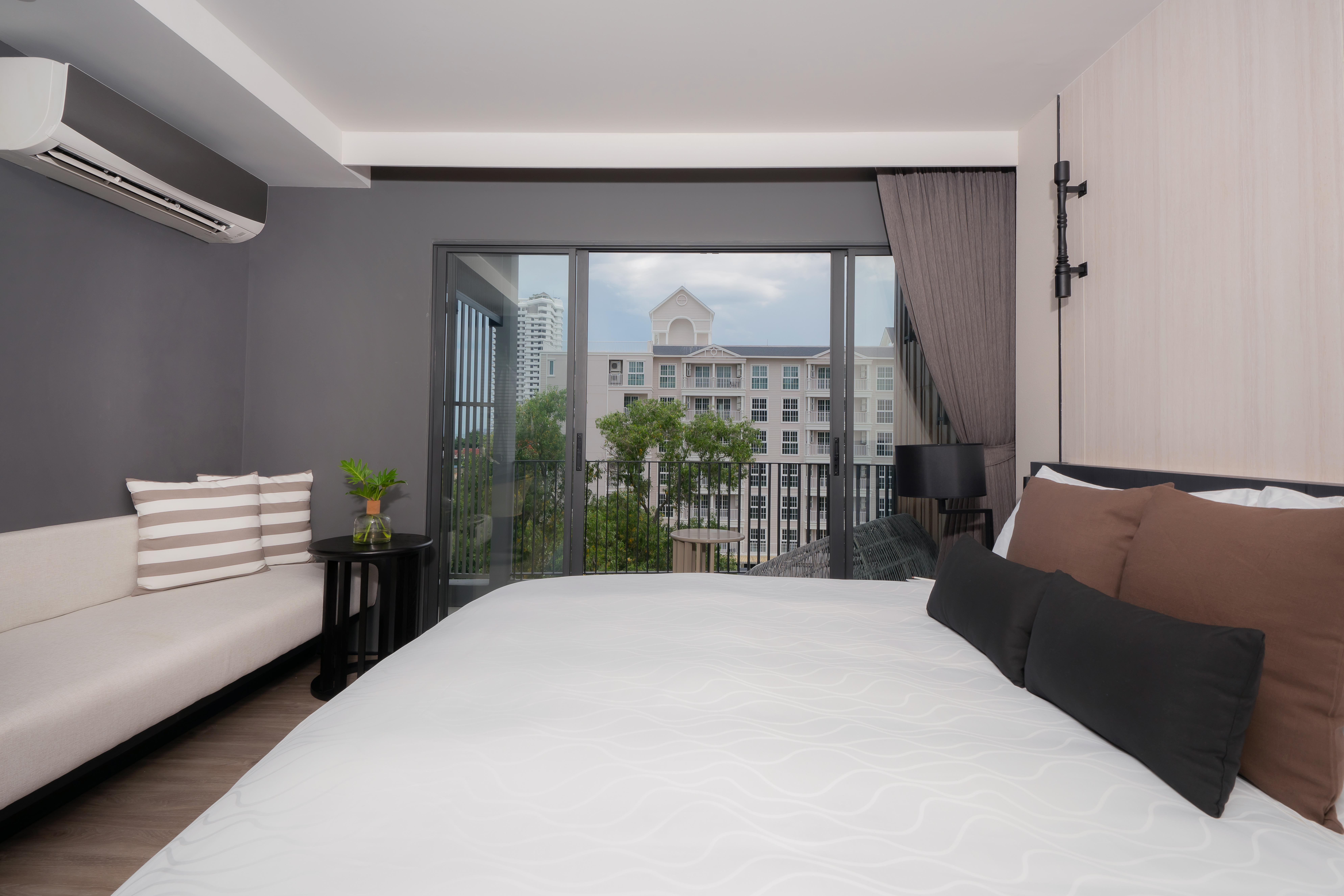 Bayphere Hotel Pattaya Jc Na Chom Thian Esterno foto A bedroom at the hotel